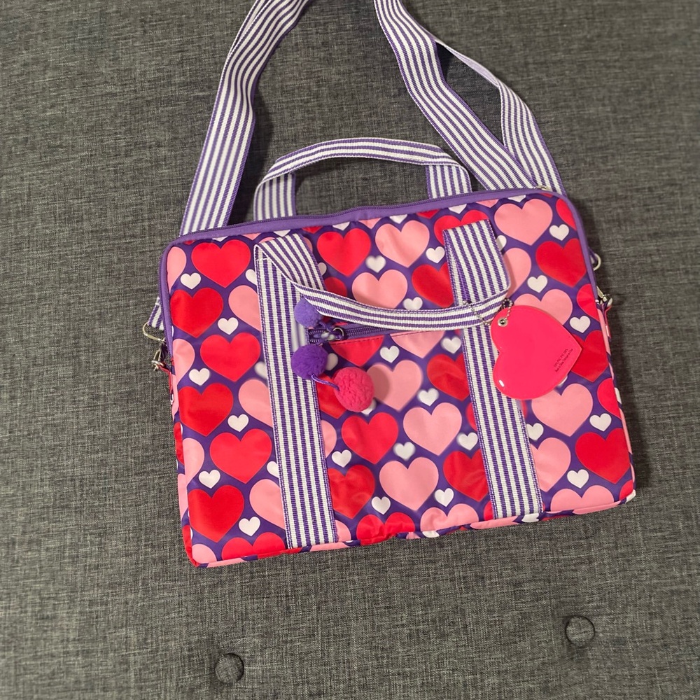 Someday" by Justin Bieber heart-patterned laptop bag.